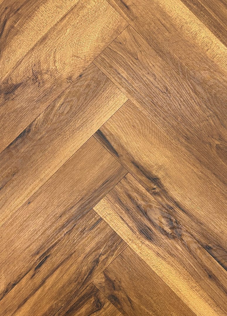 Symphony – Herringbone – LVT Flooring – Auburn Oak